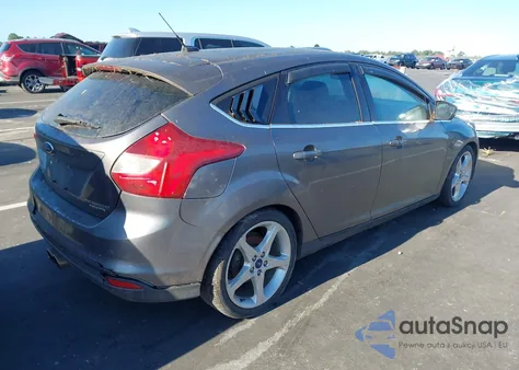 2014 Ford Focus Titanium z USA, uszkodzony, nr VIN 1FADP3N26EL190505